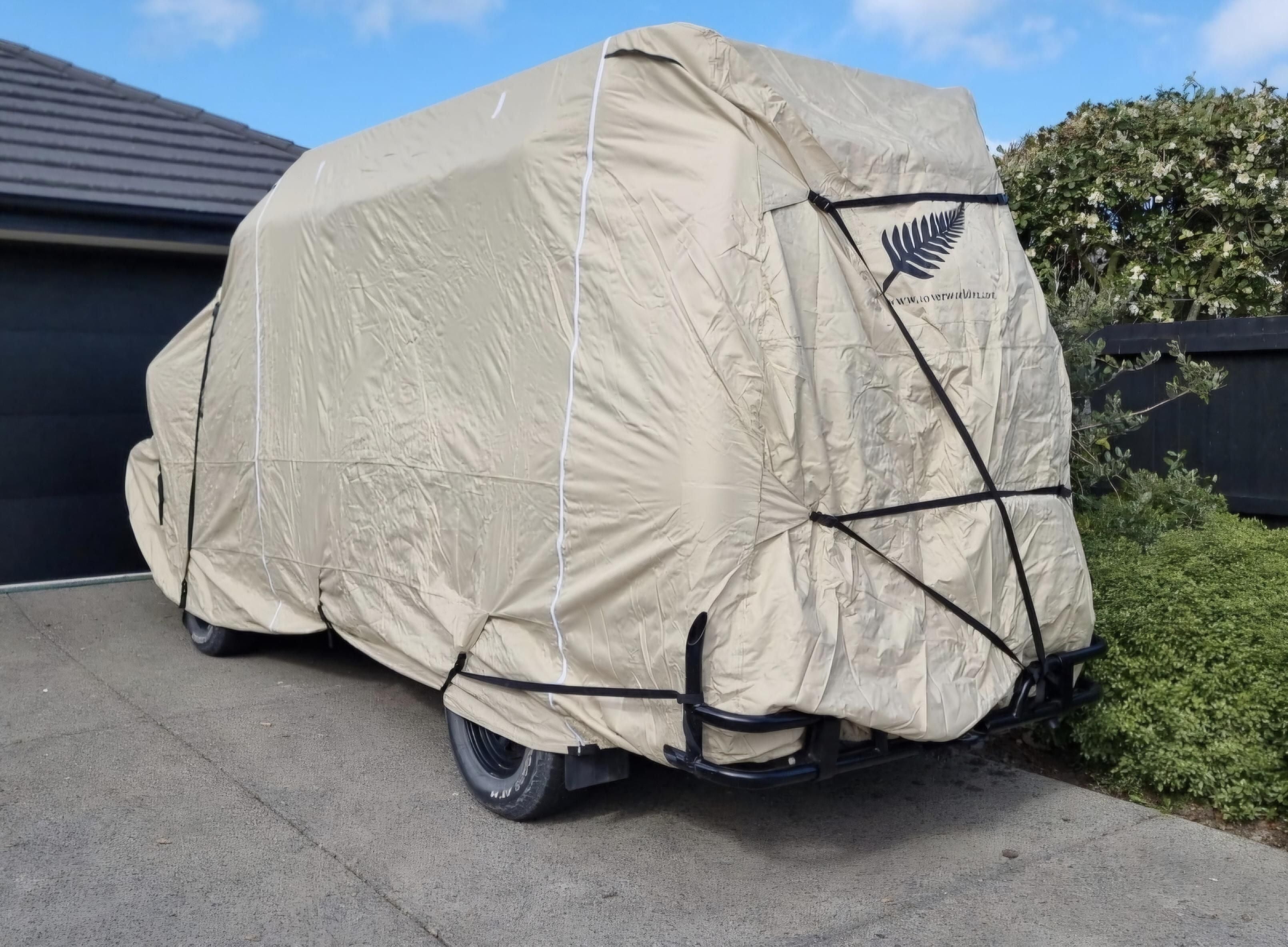 image Back of motorhome class b cover going around bull bars