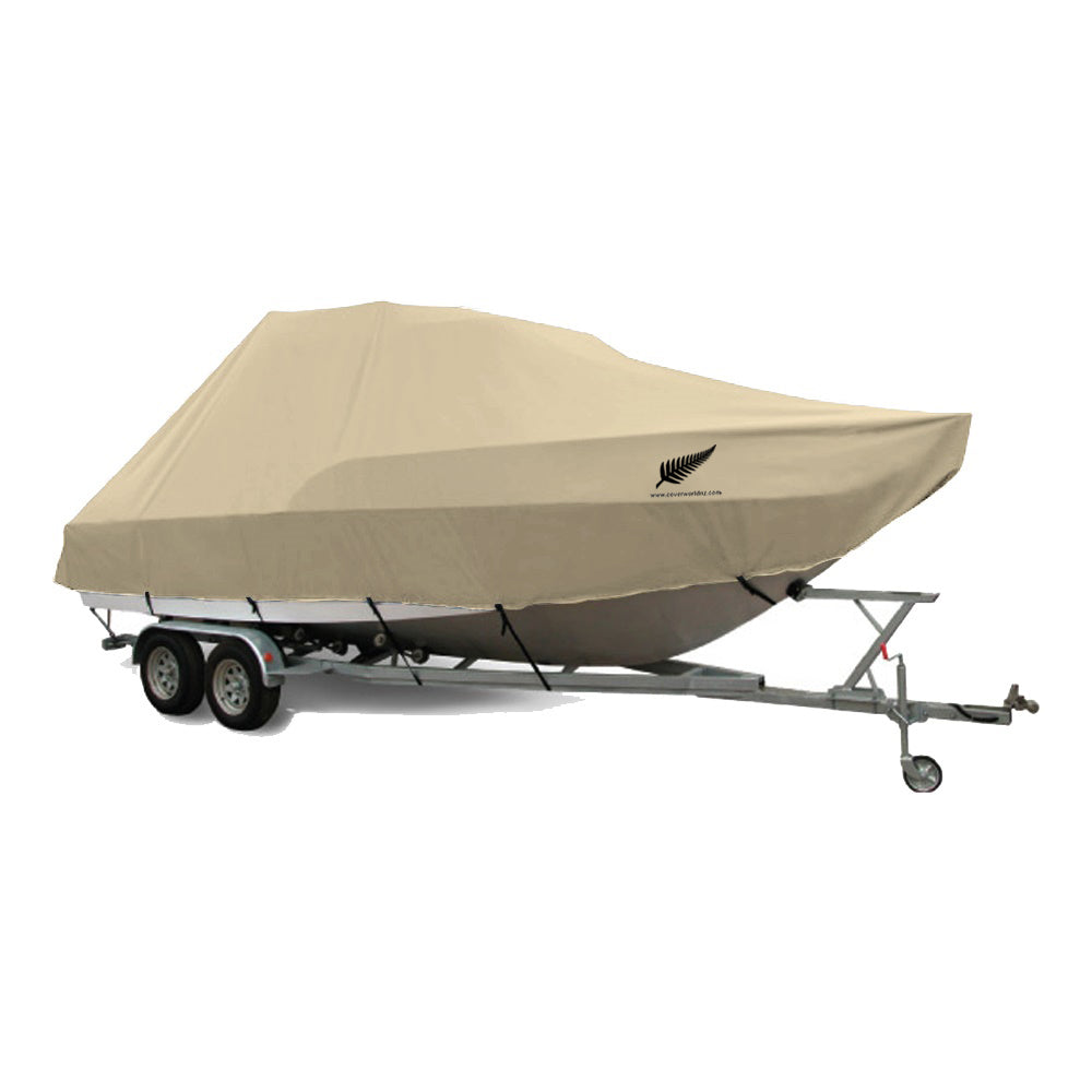 image of a hard top bimini top boat covered by beige premium cover