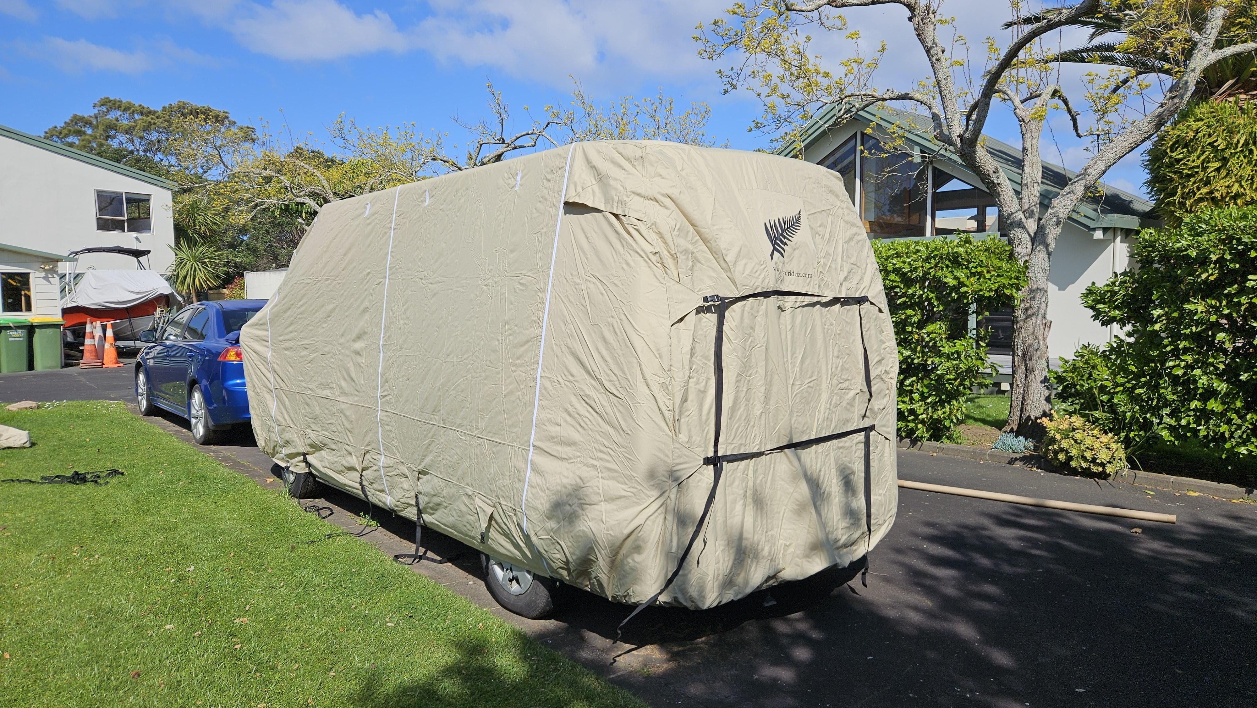 image of Back of motorhome class b cover showing straps