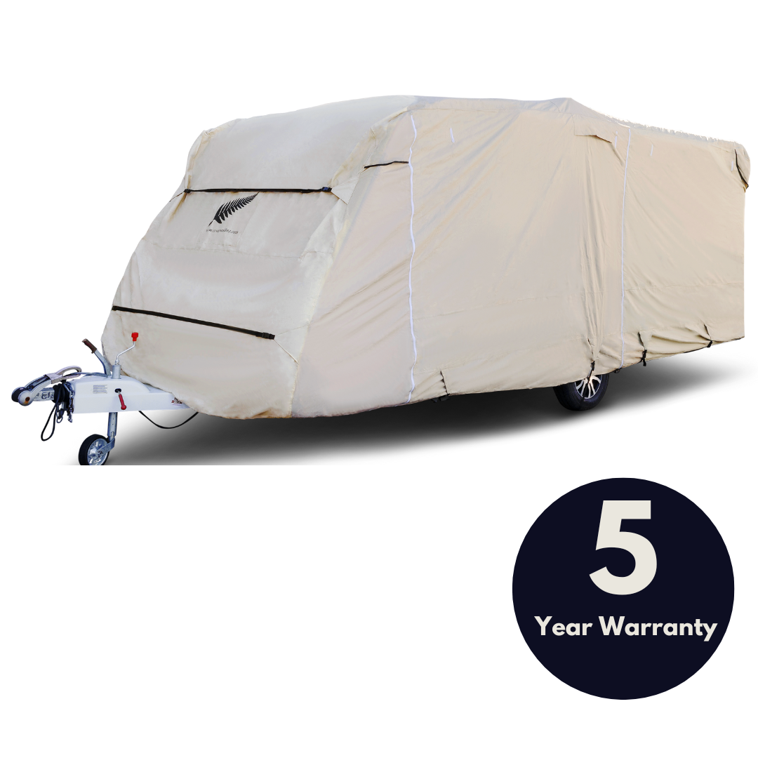 image of a caravan covered by a white caravan premium whole body cover