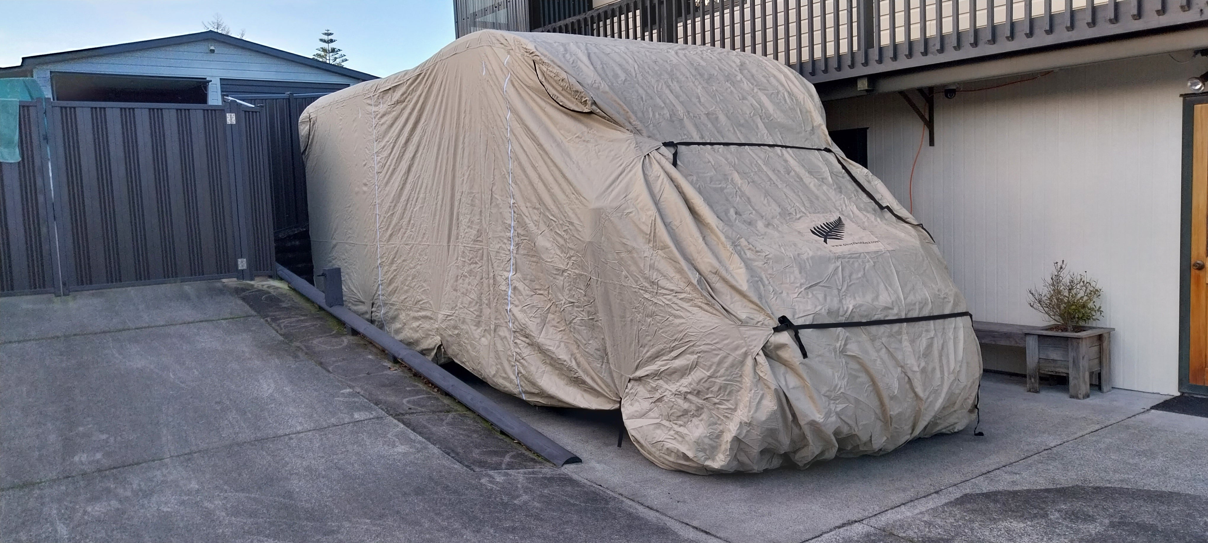 image of Front of motorhome class b cover beige showing front straps