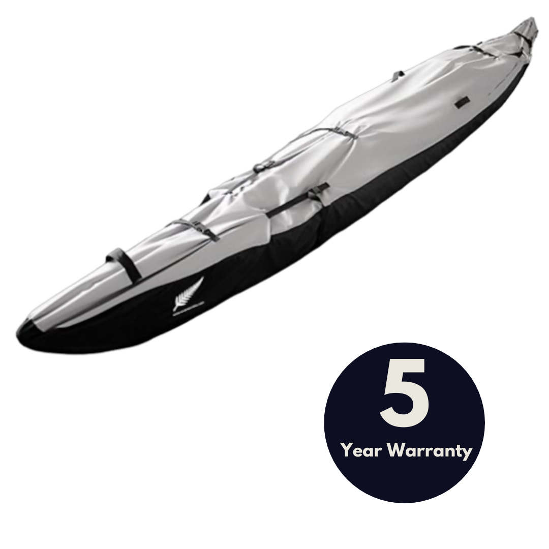 image of a kayak covered by grey and black premium cover  