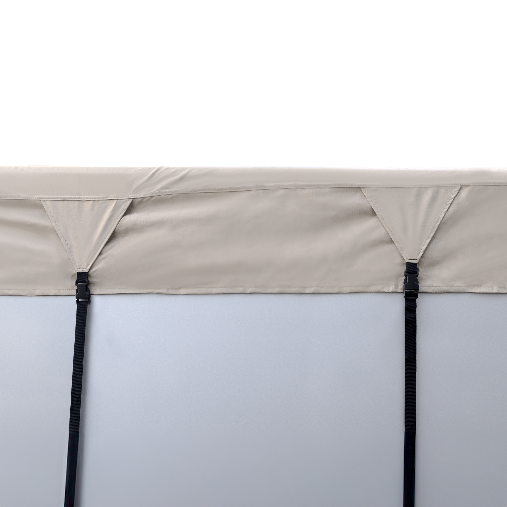 image of a side caravan covered by a white caravan roof cover with secure straps